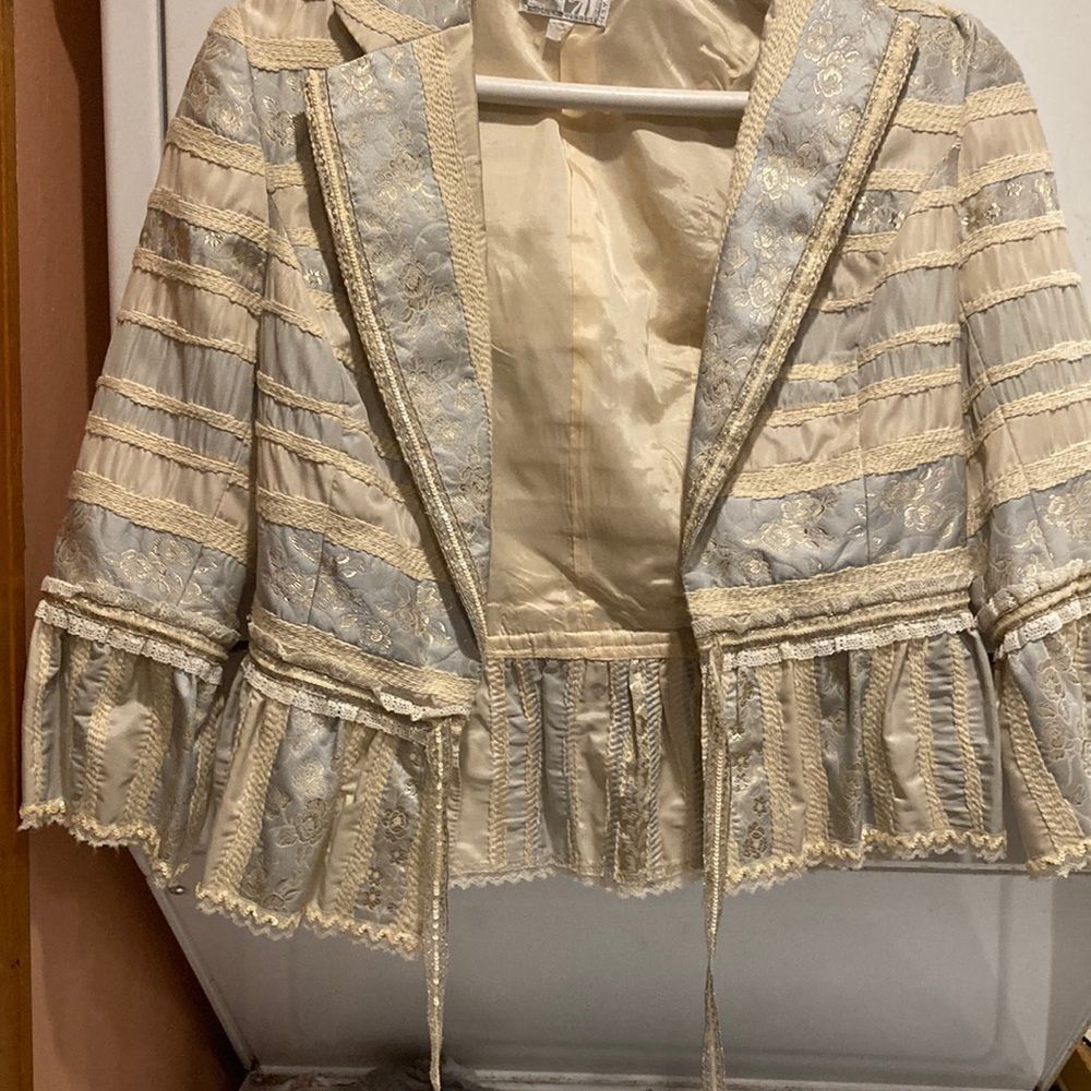 Brocade like jacket sweet design